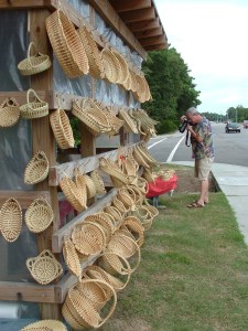 Robert Clark stands downwind of the baskets